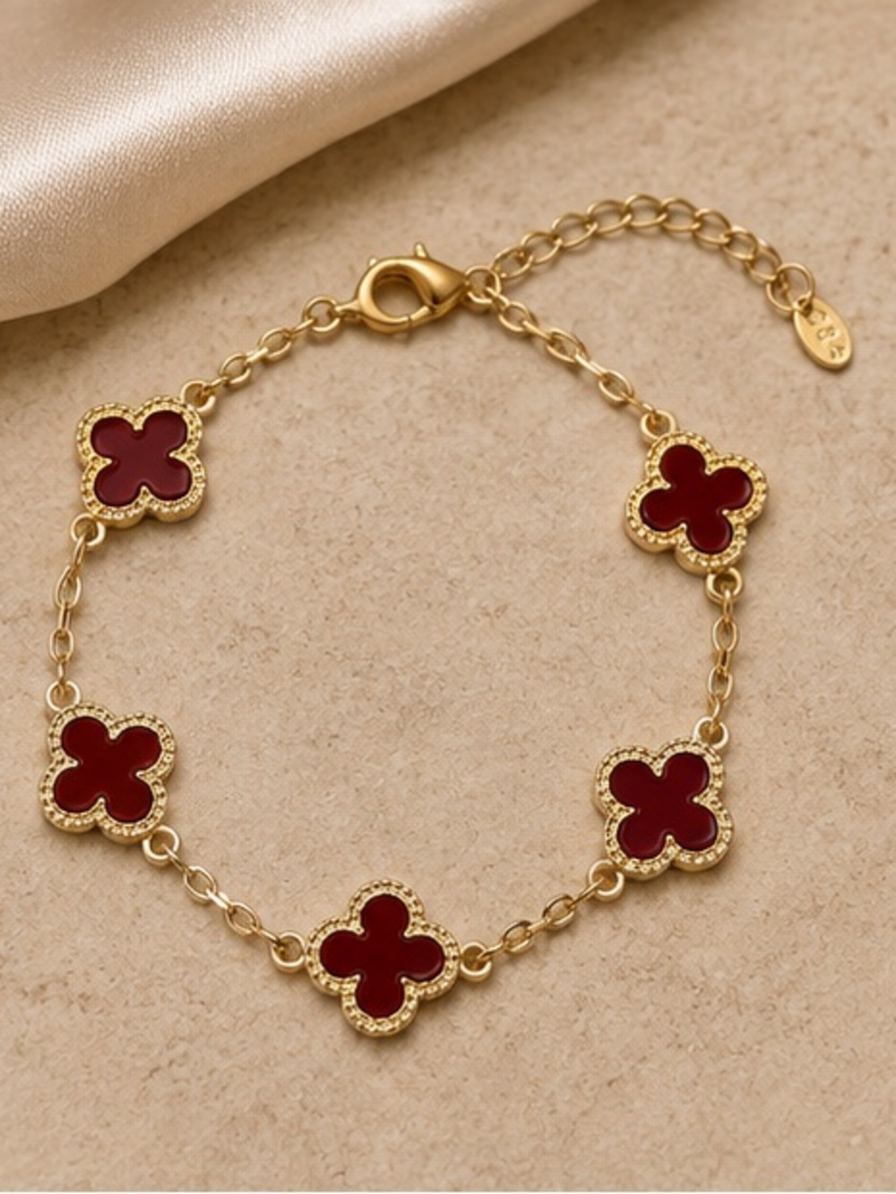 Luxe Gold Bracelet with Deep Red Clover Charms